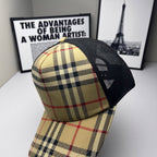 Burberry cap with beige, navy and red plaid crown, black mesh back and button top