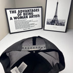 Burberry cap interior: black mesh lining with metal logo bar on the front