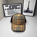Burberry cap in beige, navy and red plaid with black mesh side panels