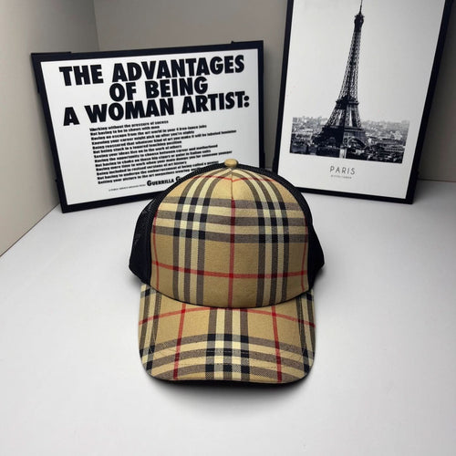 Burberry cap in beige, navy and red plaid with black mesh side panels