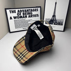 Plaid baseball cap with black interior lining and hanging label