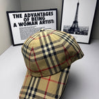 Plaid baseball cap in beige, navy, and red, close side view with crown seam