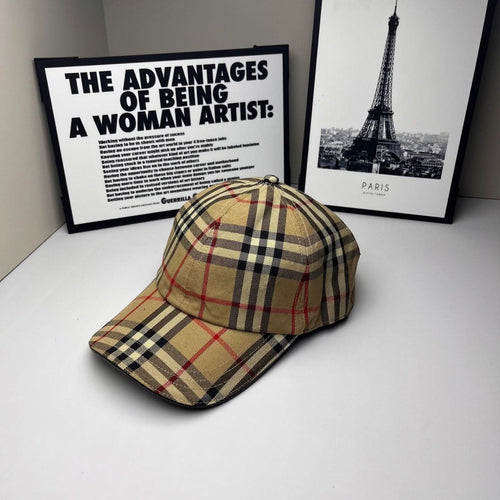 Plaid baseball cap in beige, navy, and red, side view with curved brim