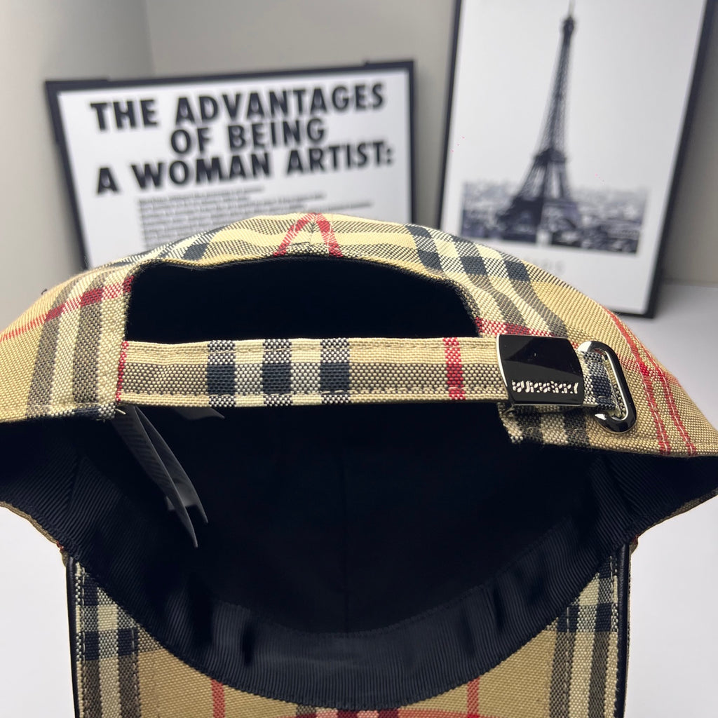 Plaid baseball cap interior with black lining and adjustable strap