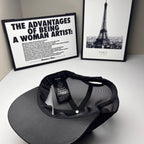 Fendi cap interior view with size/brand label, dark mesh crown and curved brim.
