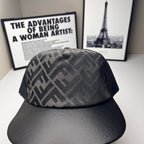 Fendi cap top view with dark gray FF monogram knit and curved black brim.