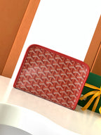 Red Goyard-pattern zip wallet with rounded corners and leather edge trim