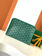 Goyard green patterned zip wallet with yellow ribbon tie