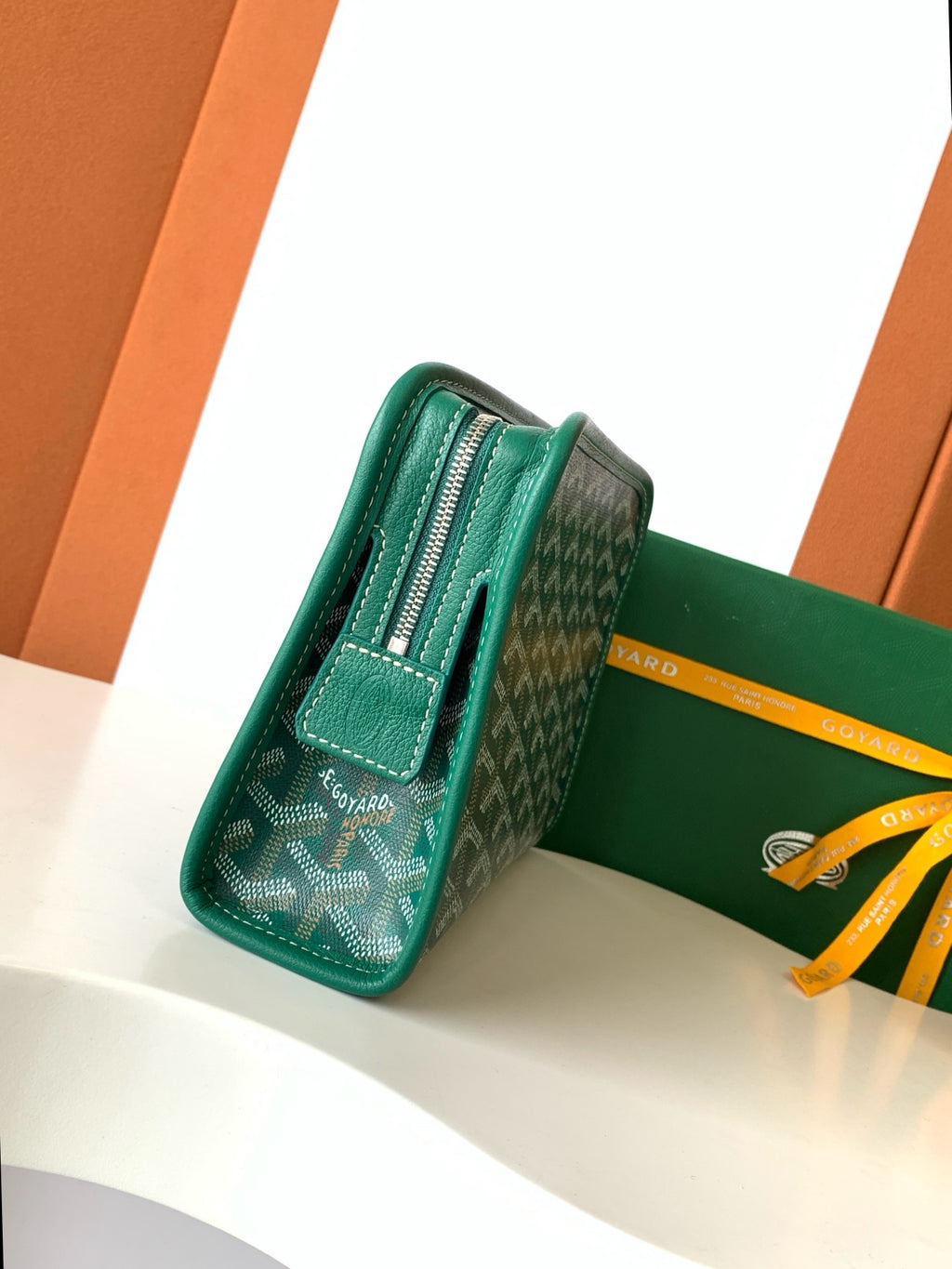 Goyard green patterned zip wallet with side zipper and snap strap