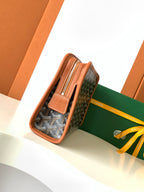 Goyard patterned zip pouch with front leather tab and brown edge trim