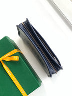 Navy Goyard zip wallet clutch side view with double zipper track