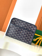 Navy Goyard pattern zip wallet clutch with logo detail and double zipper