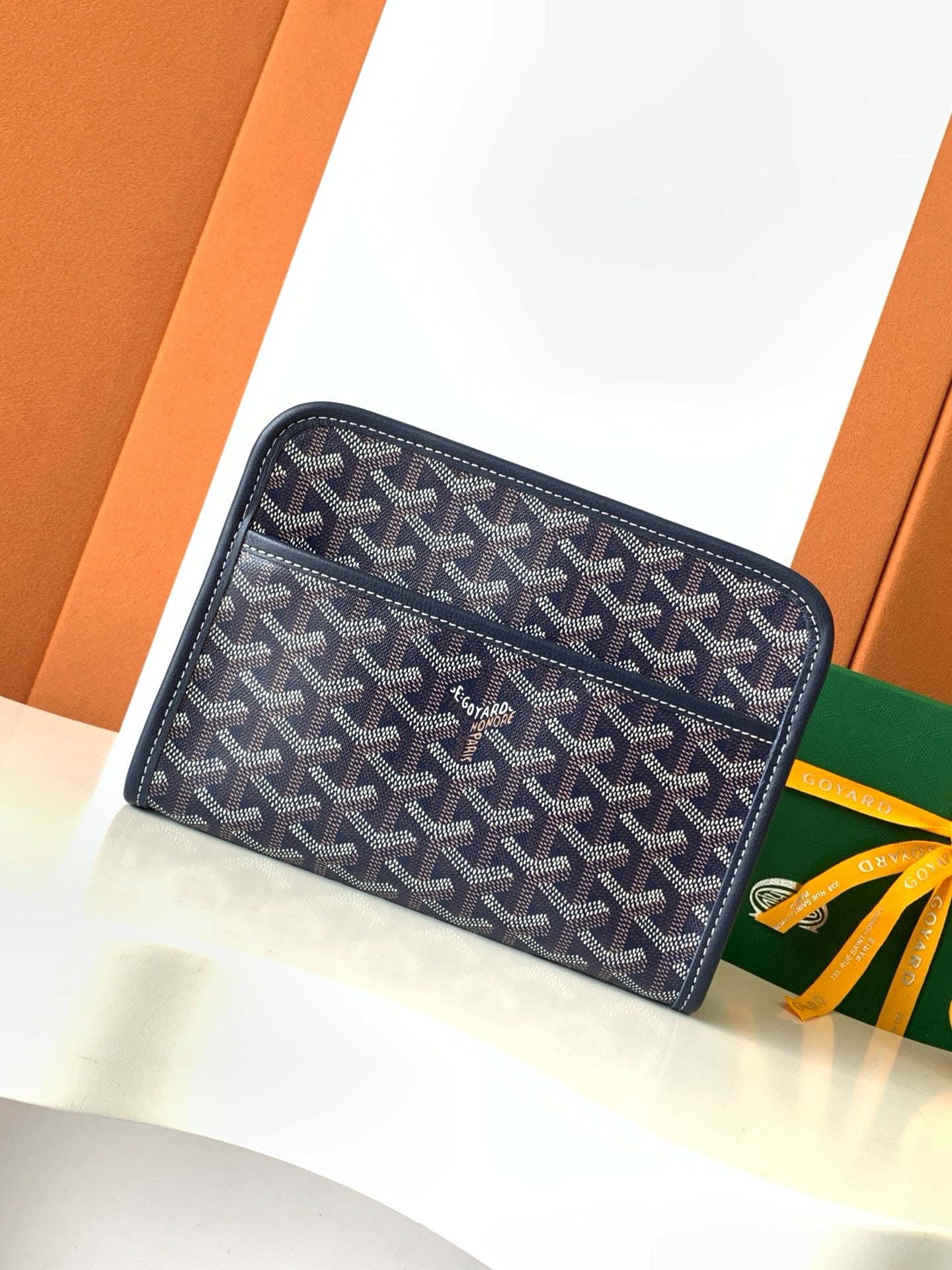 Navy Goyard pattern zip wallet clutch with logo detail and double zipper