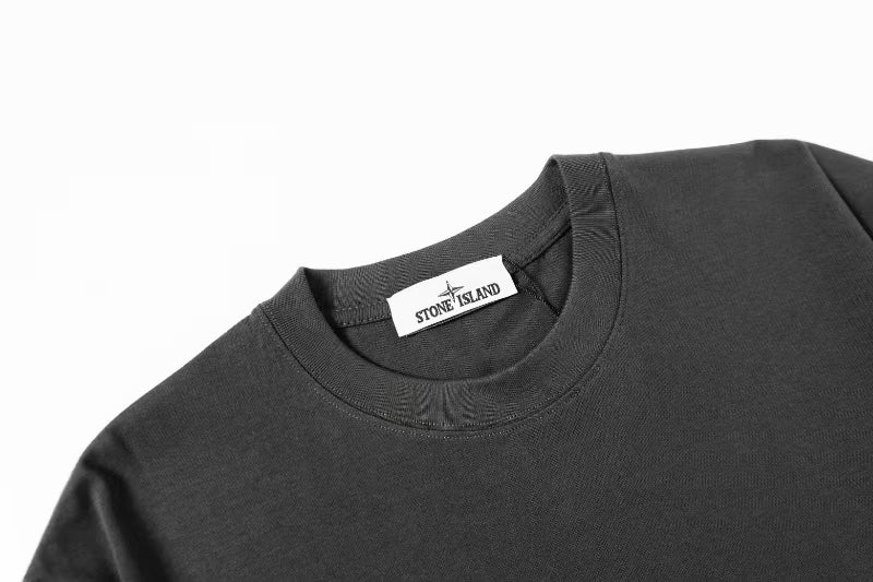 Stone Island short-sleeve T-shirt, dark gray crew neck close-up