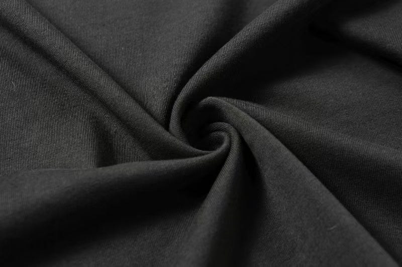 Stone Island dark gray T-shirt fabric close-up, smooth knit texture