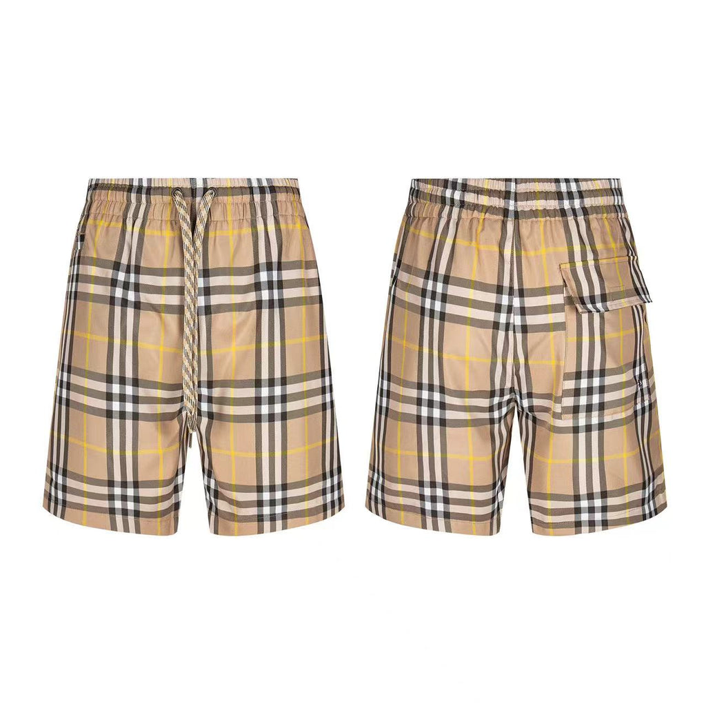Plaid shorts with drawstring waist and side patch pockets, beige and black check pattern