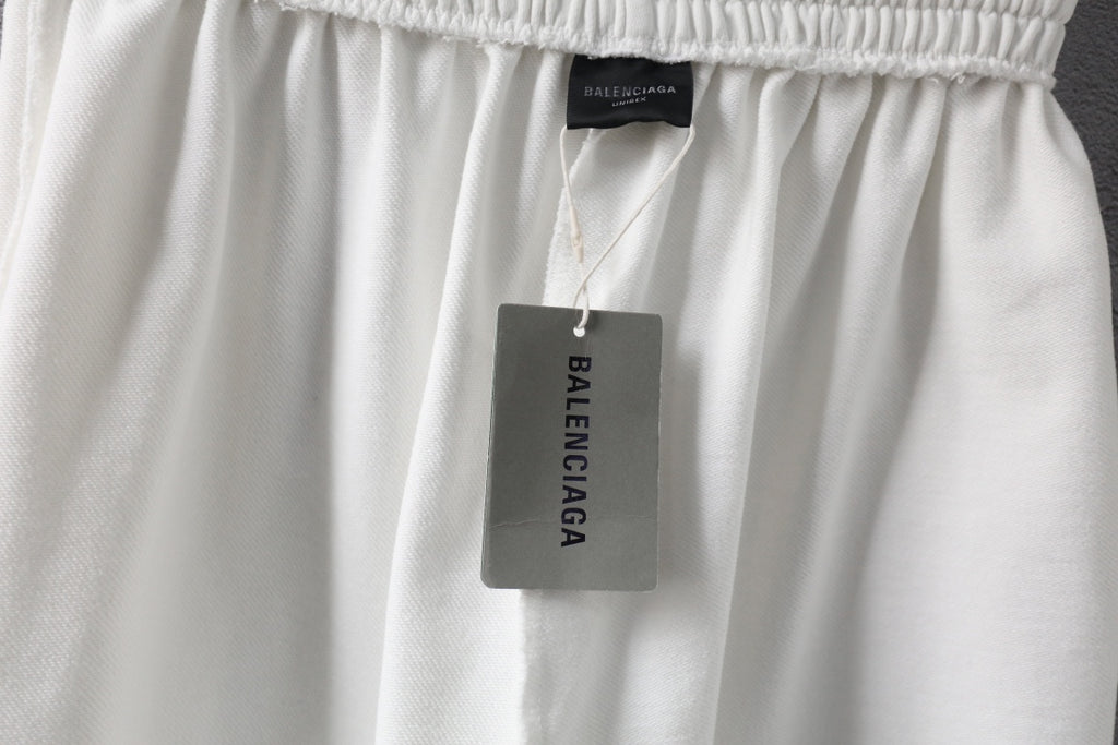 White shorts with Balenciaga tag at waistband and gathered fabric