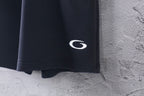 Dark short-length Balenciaga pants with C logo on side hem