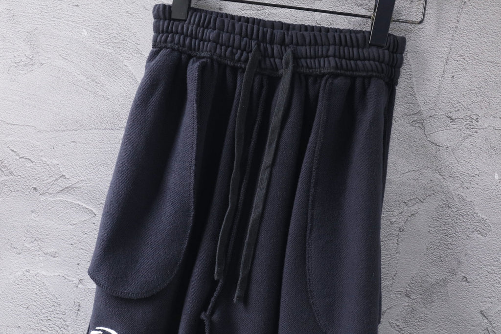 Dark Balenciaga pants with elastic waistband and draped pleats