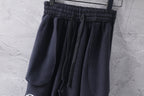Dark Balenciaga pants with elastic waistband and draped pleats