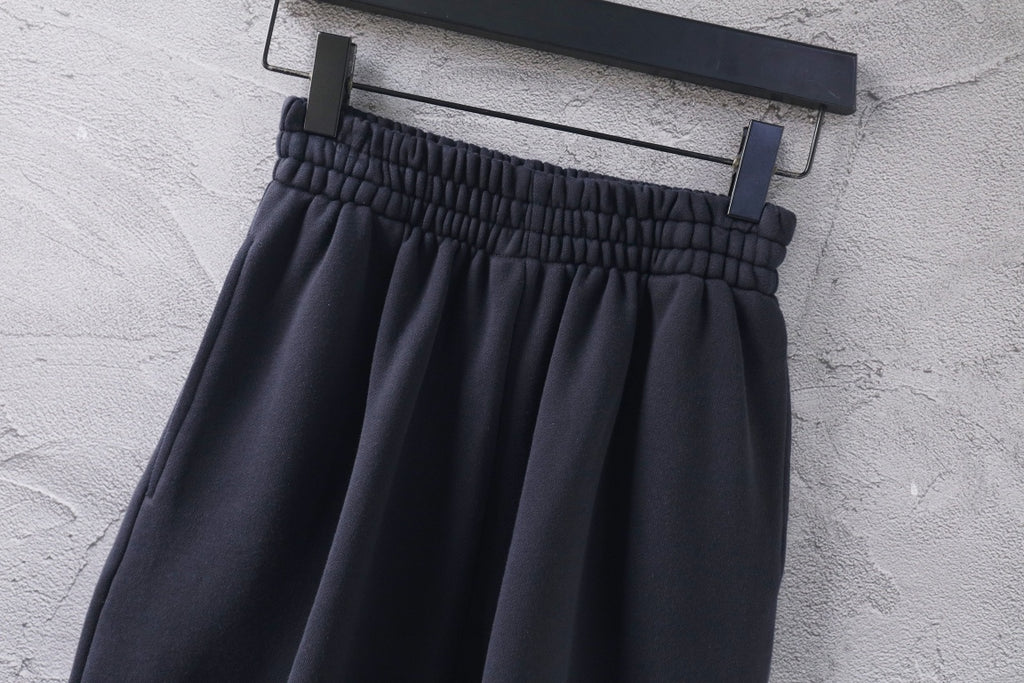 Dark Balenciaga pants with elastic waistband and pleated front