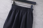 Dark Balenciaga pants with elastic waistband and pleated front
