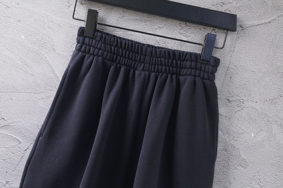Dark Balenciaga pants with elastic waistband and pleated front