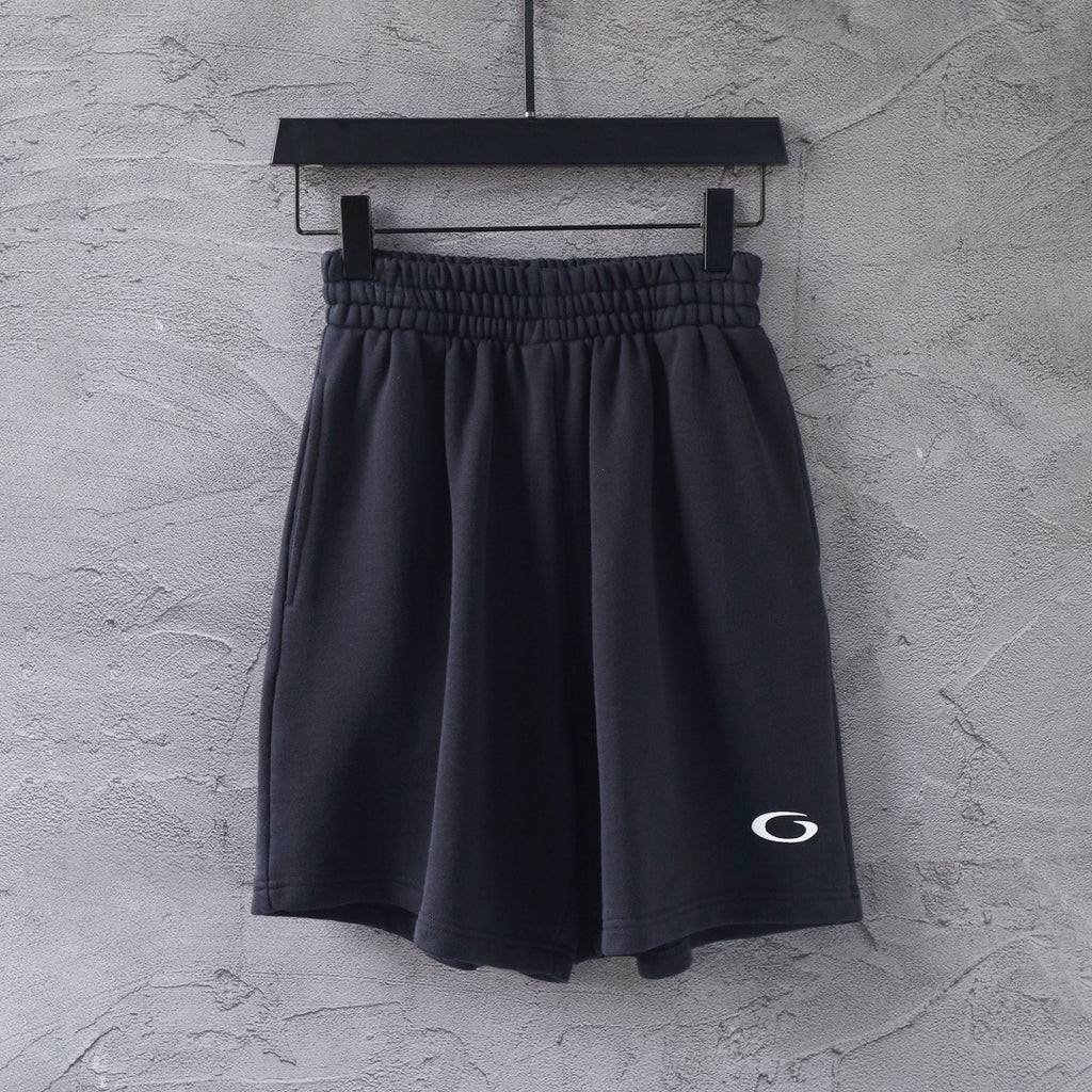 Dark Balenciaga pants with elastic waistband and pleated legs