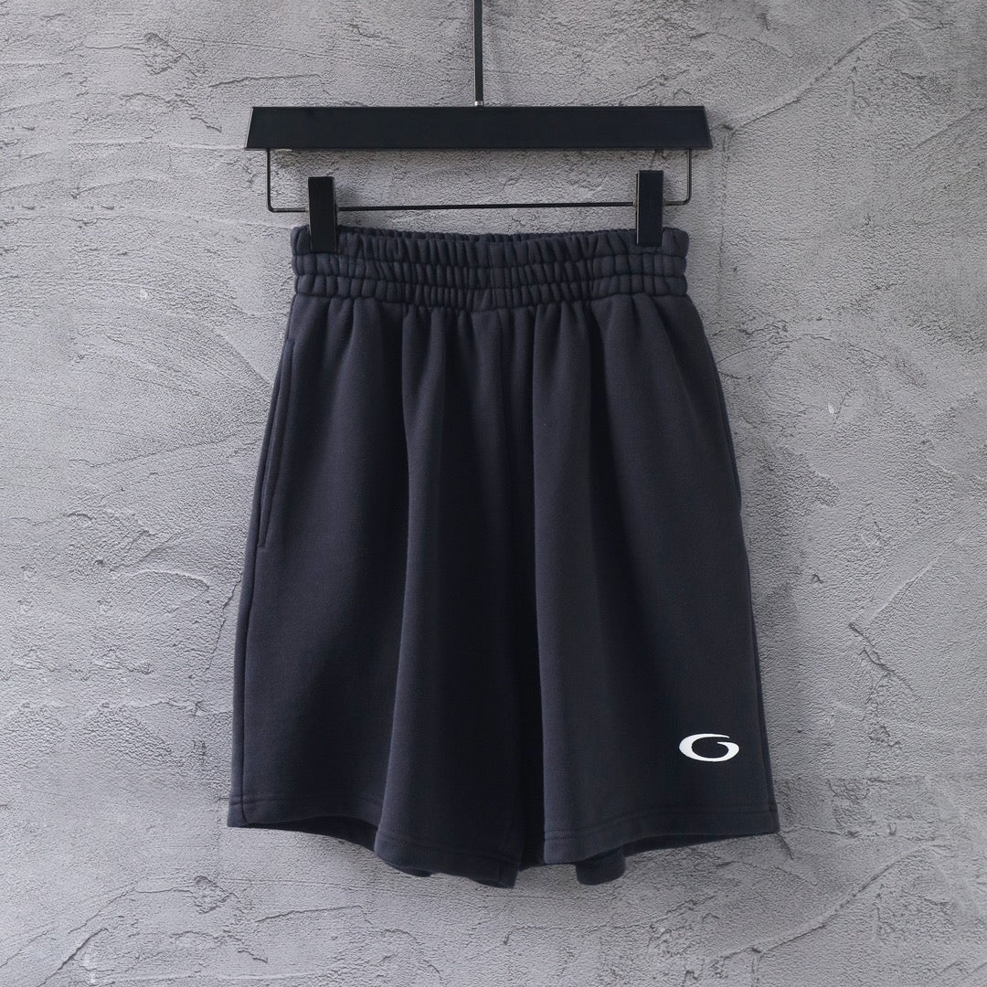Dark Balenciaga pants with elastic waistband and pleated legs