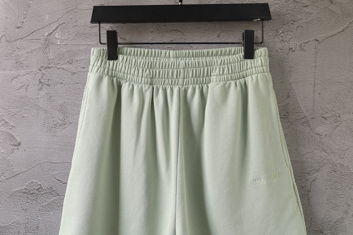 Balenciaga light green smocked waist shorts with gathered waistband detail