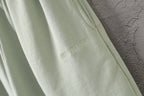 Balenciaga light green shorts with small embroidered logo on leg