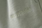 Balenciaga logo on light-green fabric detail