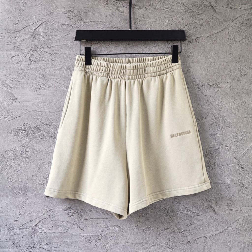Balenciaga cream shorts with elastic waistband and small side logo