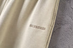 Cream shorts with BALENCIAGA logo on the front leg