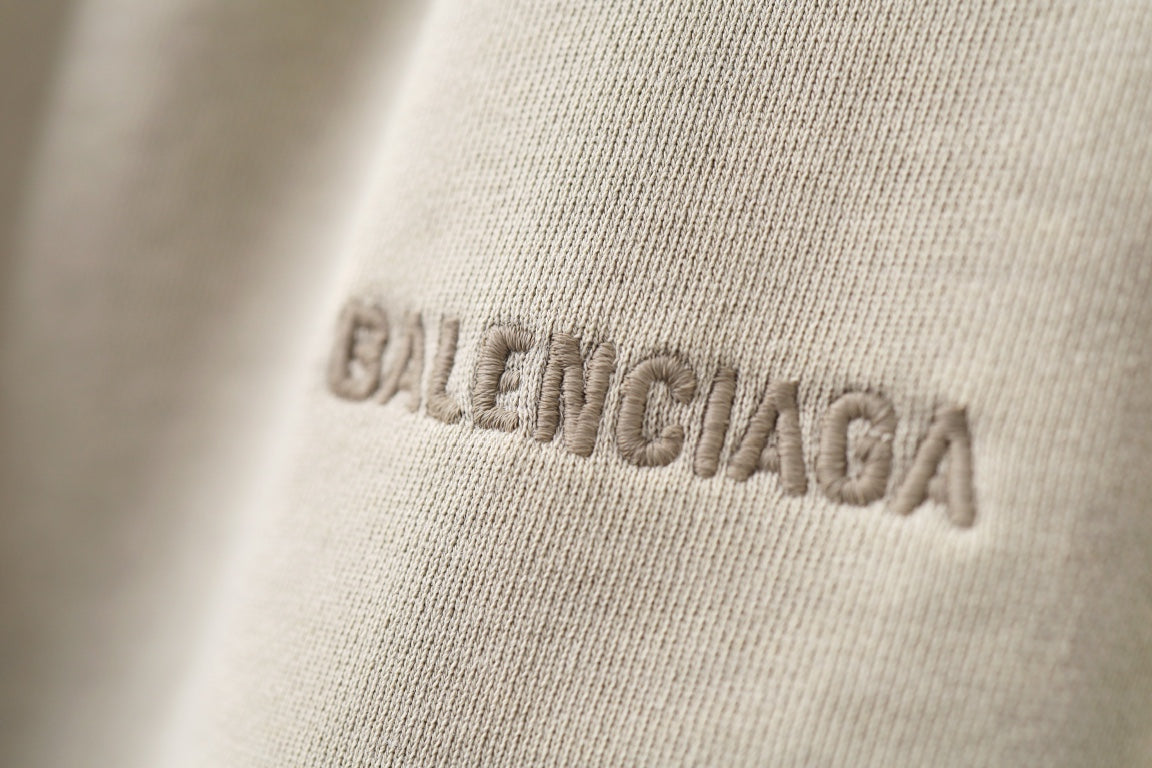 Cream shorts with BALENCIAGA logo embroidery on fabric