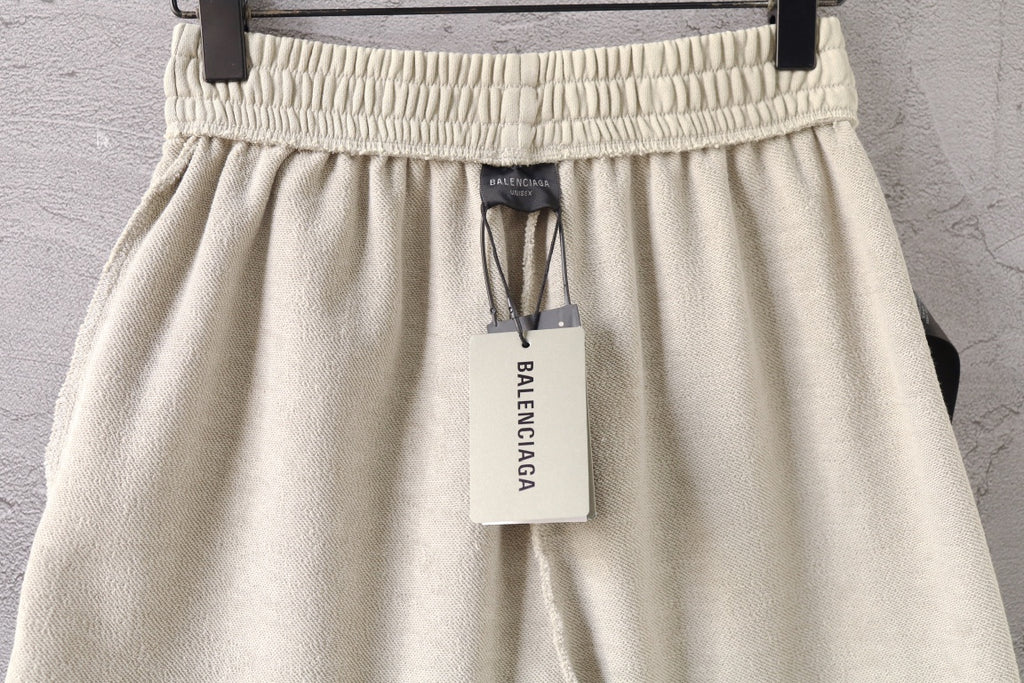 Cream shorts with elastic waistband and BALENCIAGA label tag