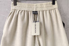 Cream shorts with elastic waistband and BALENCIAGA label tag