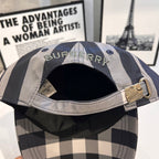 Burberry plaid baseball cap with oval Burberry logo patch on the front