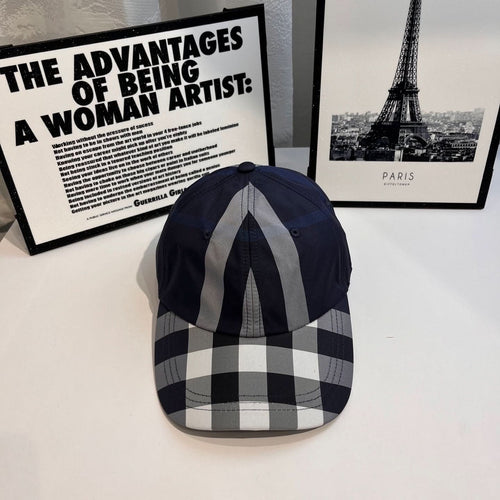 Navy plaid baseball cap with gray and white vertical stripes on the front panel