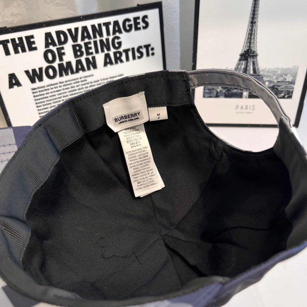 Baseball cap interior with adjustable strap and white care label