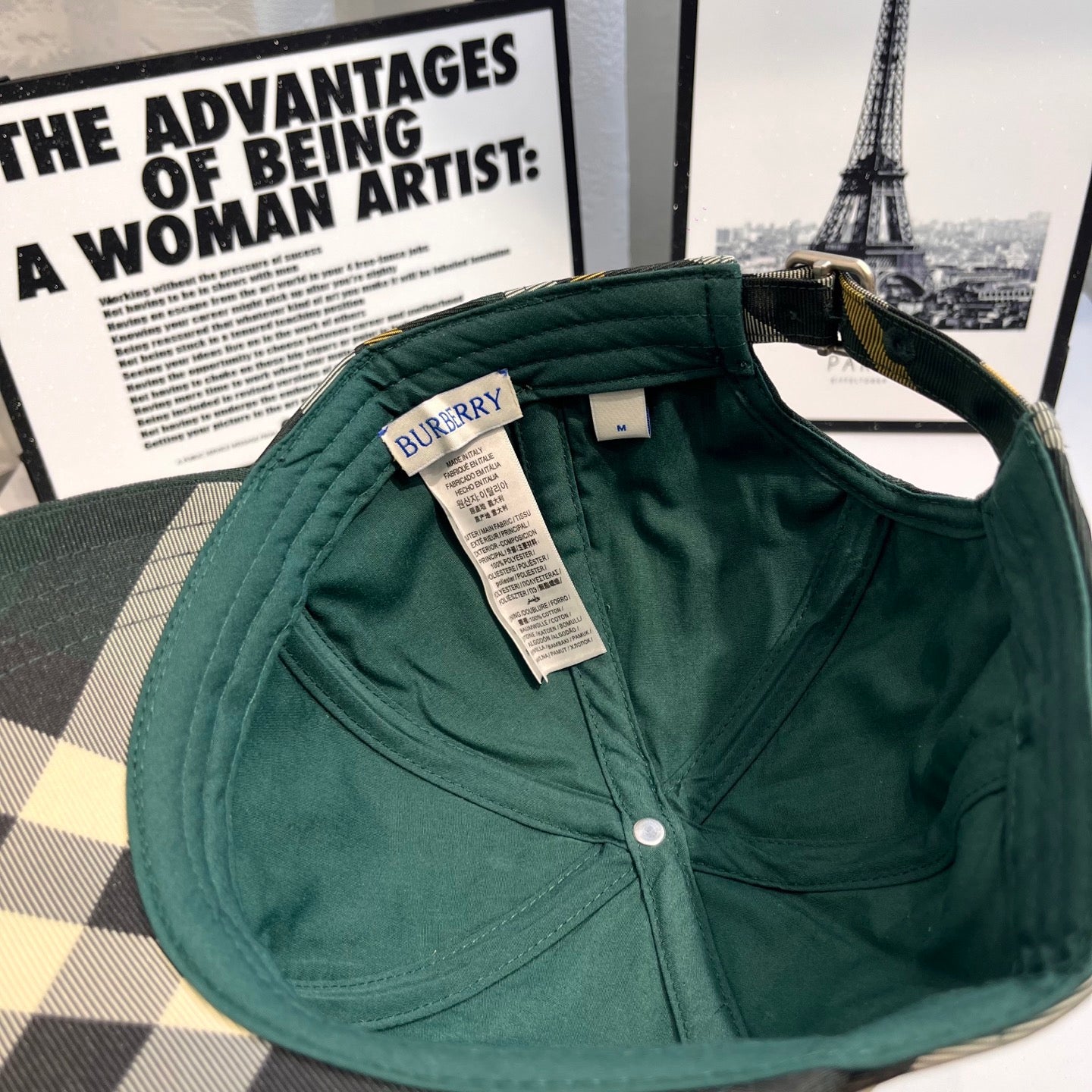 Burberry plaid baseball cap with green interior and attached size label