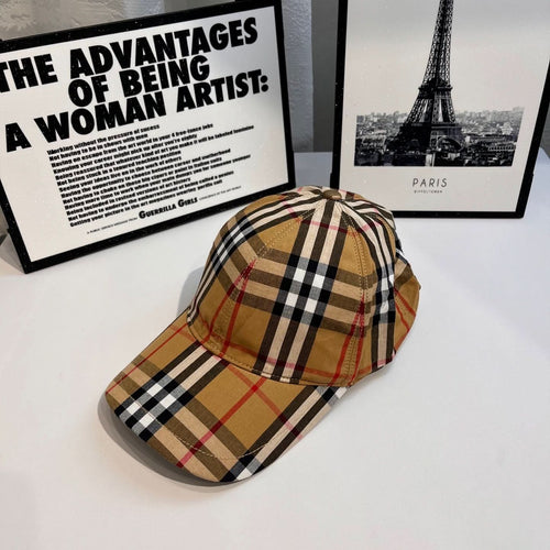 Plaid baseball cap with curved brim, tan crown, black and red tartan pattern