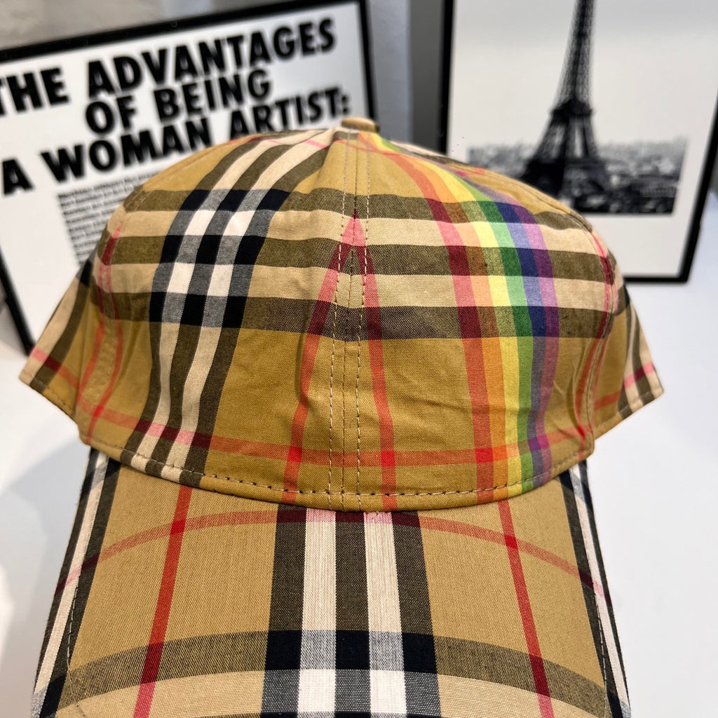 Burberry tartan plaid baseball cap, close top view with button and colorful stripe lines