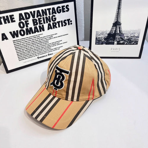 Striped baseball cap side view with navy B logo patch