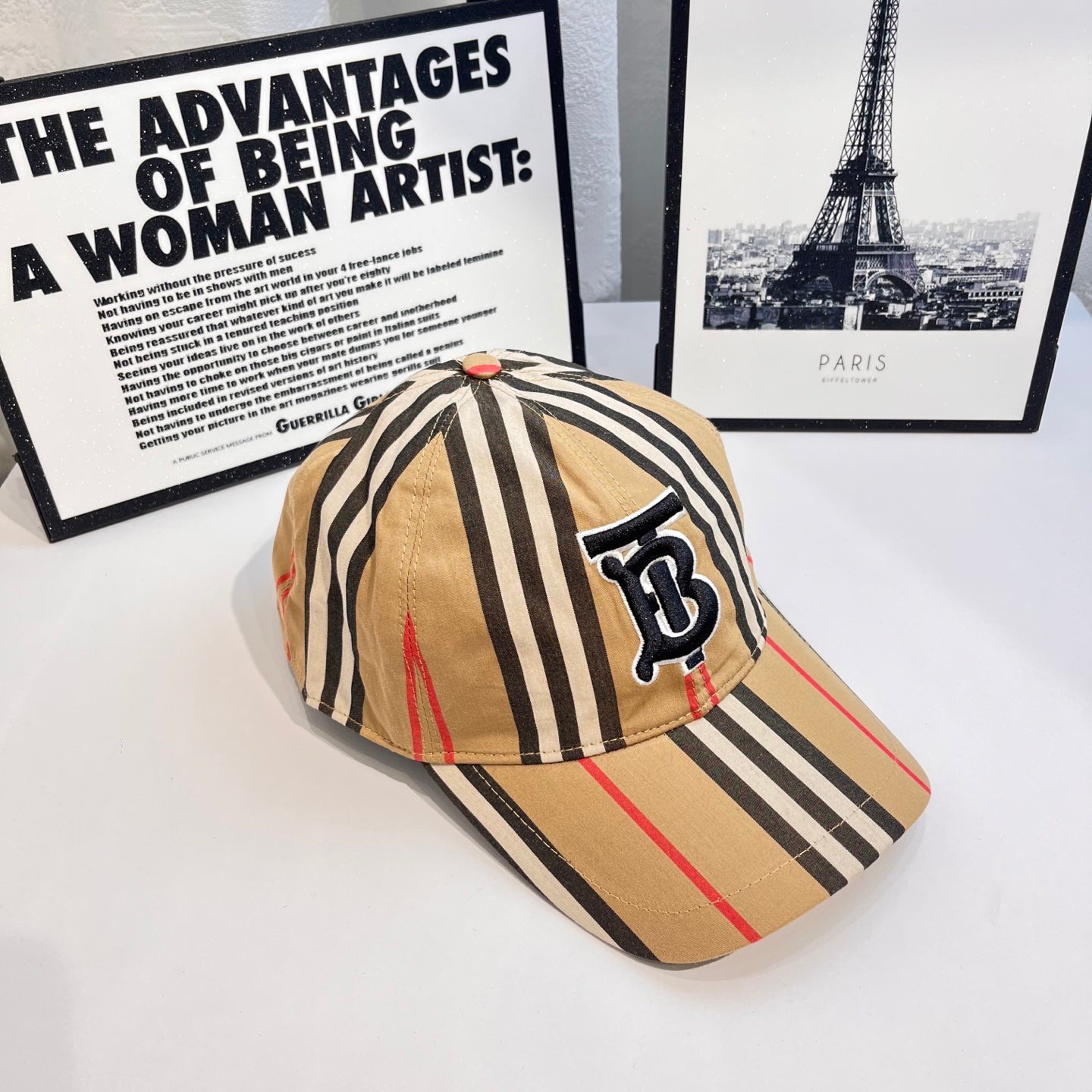 Striped baseball cap angled view with navy B logo