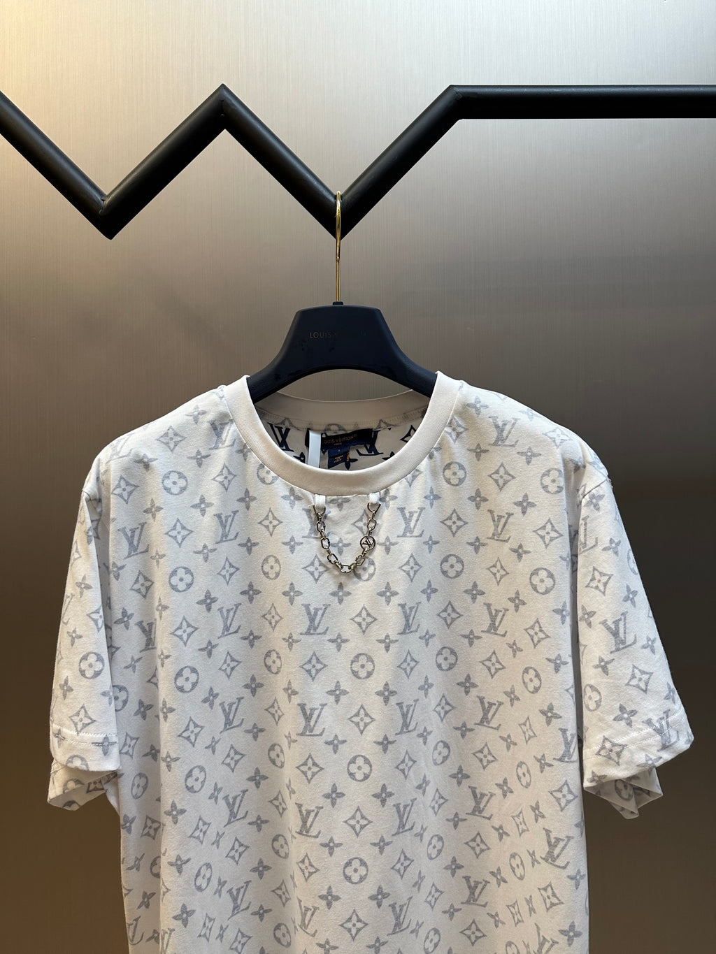 Light monogram patterned T-shirt back view with crew neck and short sleeves