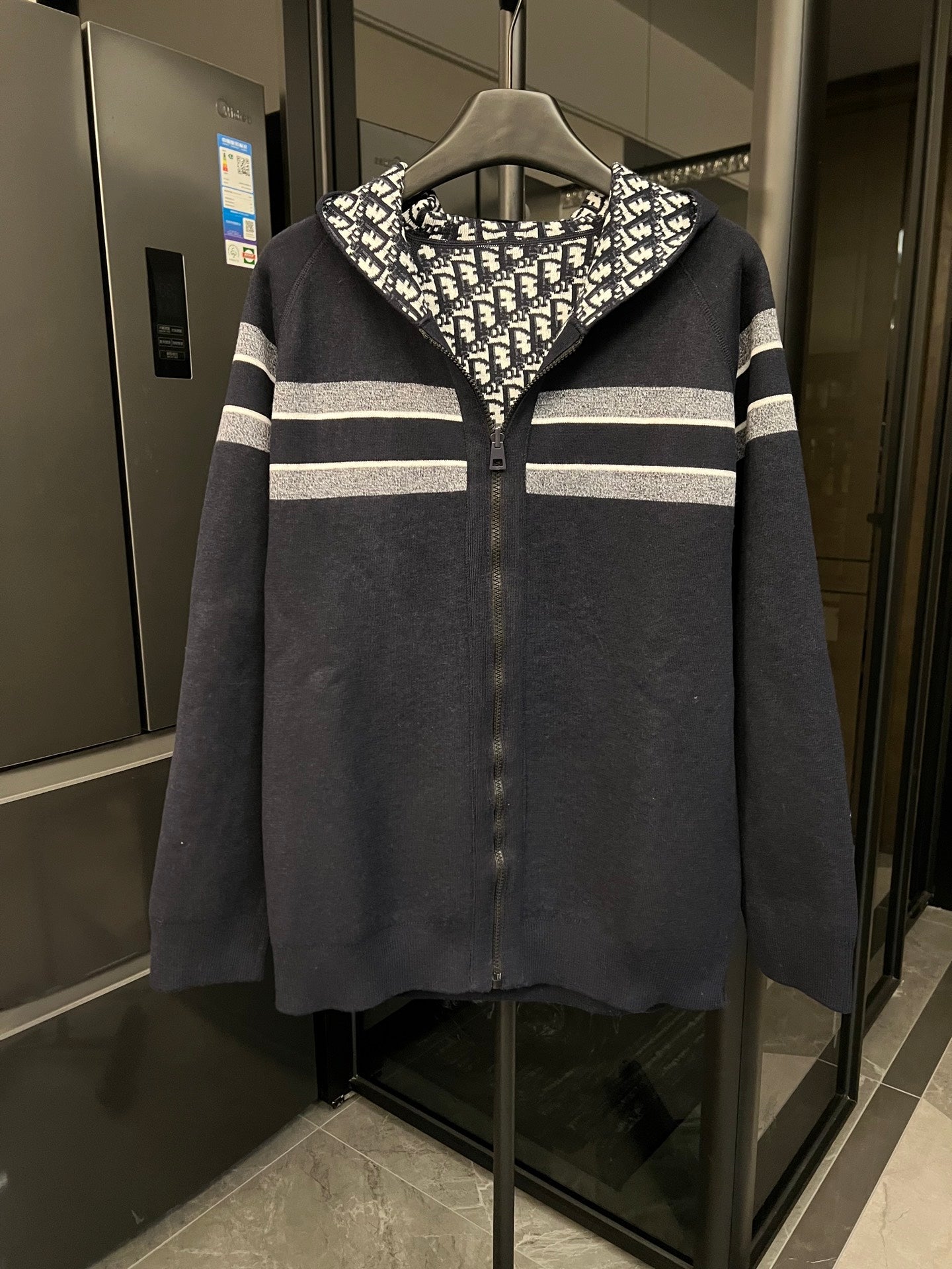 Dior hooded zip jacket in dark gray with horizontal stripe bands and full front zip