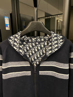 Dior hooded zip jacket with logo print hood and black base with white stripe accents