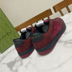 Gucci unisex sneakers back view with burgundy leather, black heel trim, and cushioned collar