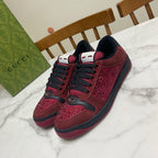 Gucci unisex sneakers, burgundy leather with black laces and side stripe detail
